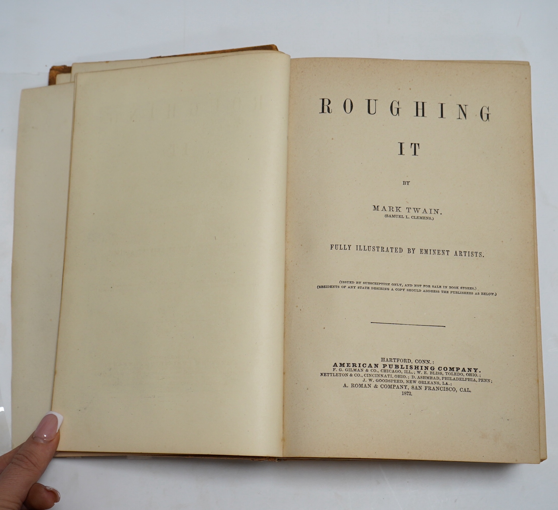 Twain, Mark [Samuel L. Clemens] - Roughing it, 8vo, calf, backstrip torn, boards scuffed, front inner hinge weak, front fly leaf with ink ownership inscription - ‘’John R. Baldwin, Christmas 1872’’, American Publishing C